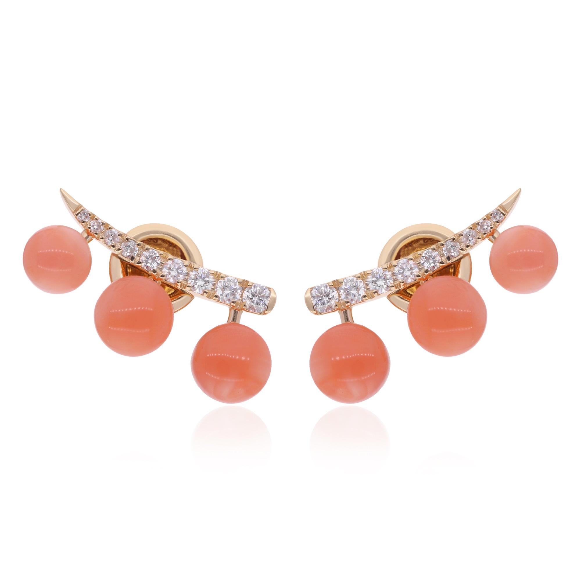 Adorning the Coral gemstones are shimmering Diamonds, meticulously set to add a touch of glamour and sparkle to the earrings. Each diamond is carefully chosen for its exceptional clarity and brilliance, ensuring that the earrings radiate with