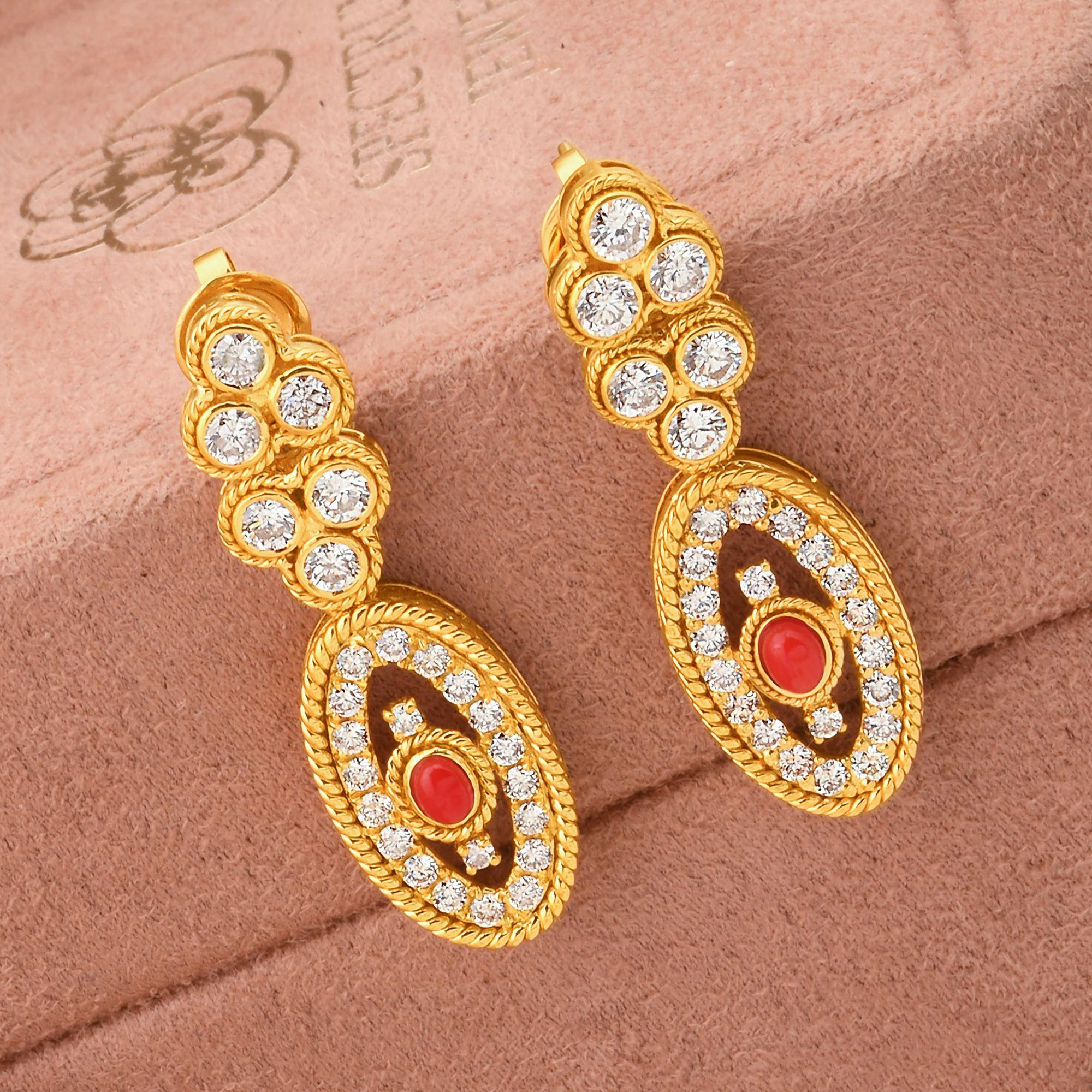 Item Code :- CN-16790A
Gross Wt. :- 11.11 gm
18k Yellow Gold Wt. :- 10.71 gm
Natural Diamond Wt. :- 1.60 Ct. ( AVERAGE DIAMOND CLARITY SI1-SI2 & COLOR H-I )
Coral Wt. :- 0.40 Ct.
Earrings Size :- 38 mm approx.

✦ Sizing
.....................
We can