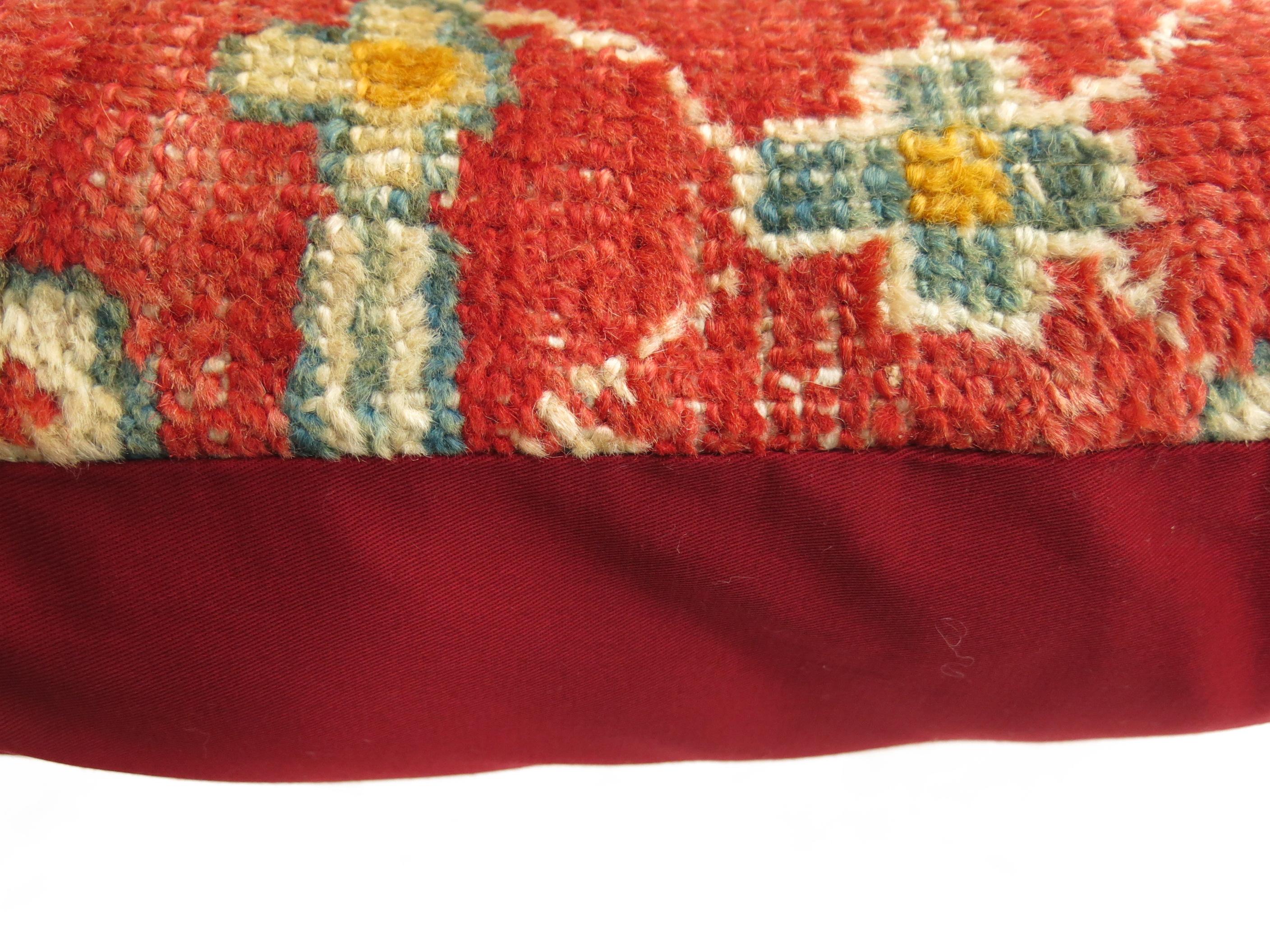 Pillow made from an early 20th century coral and gold color antique Oushak rug

Measures: 16