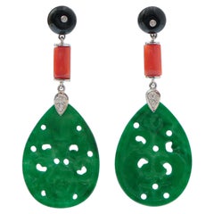Ohrringe aus Platin mit Koralle, Jade, Onyx, Diamanten und Platin.