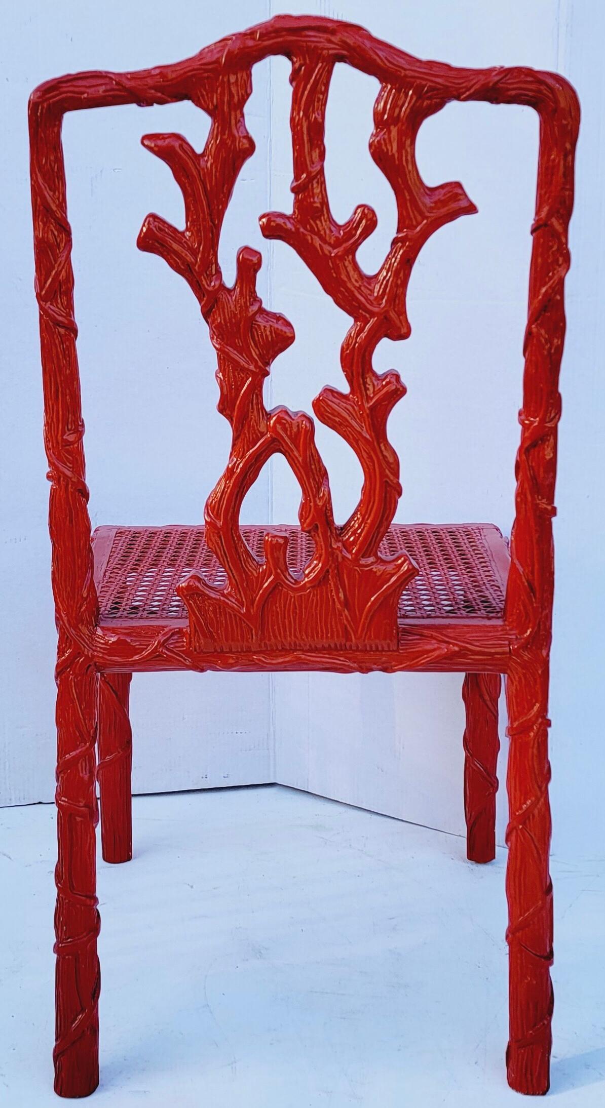 This is a fun side chair attributed to Dennis & Leen. It is a carved faux bois frame with a caned seat. It is in very good condition.
