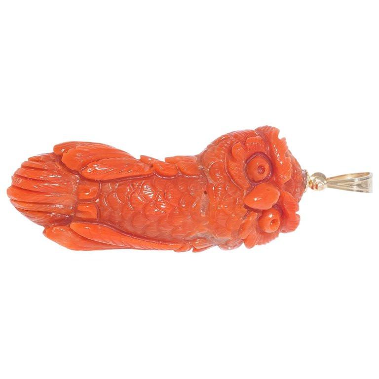
A coral pendant sculpted in the form of an owl.  Weight, 9,3 g, height 3,7 cm.