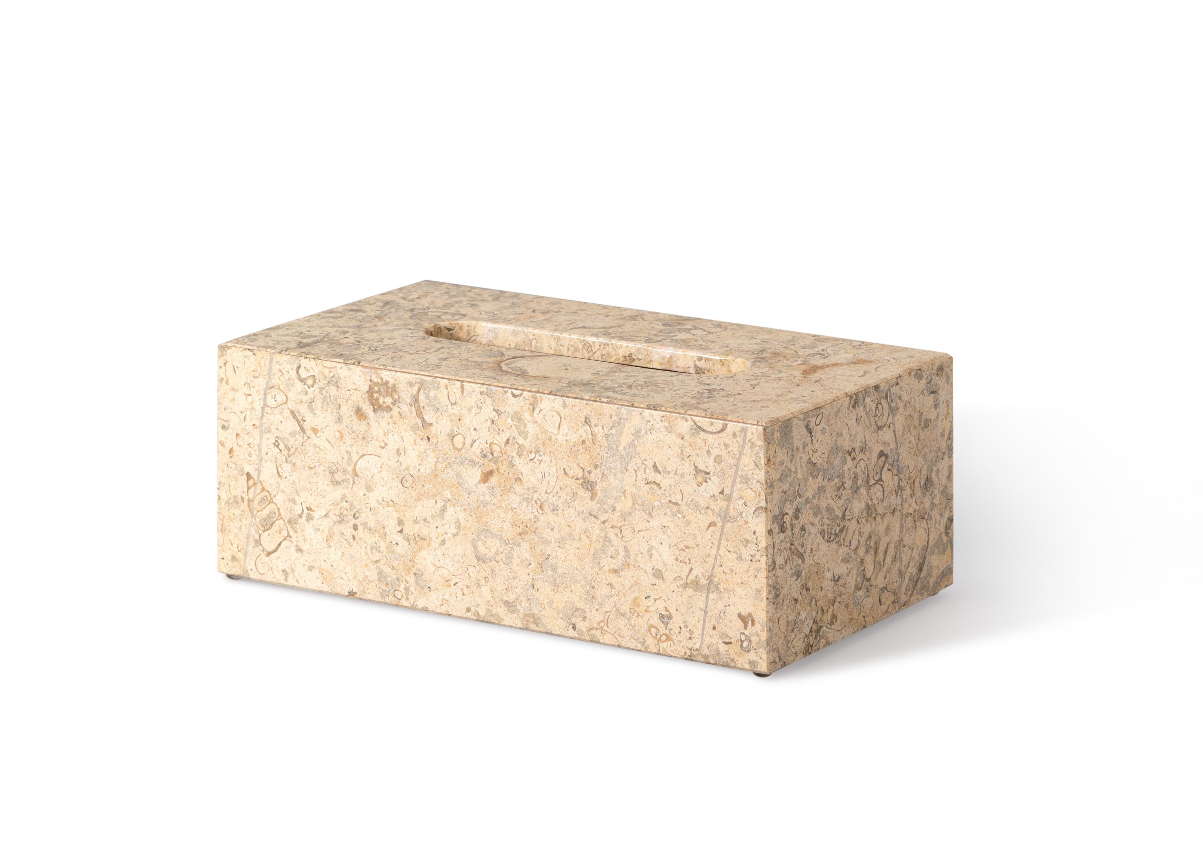 Crafted entirely by hand, this marble tissue box cover is a fusion of form and function, seamlessly blending into any space while adding sophistication and elegance. Clean, minimalist lines highlight the natural veining of the marble, making each