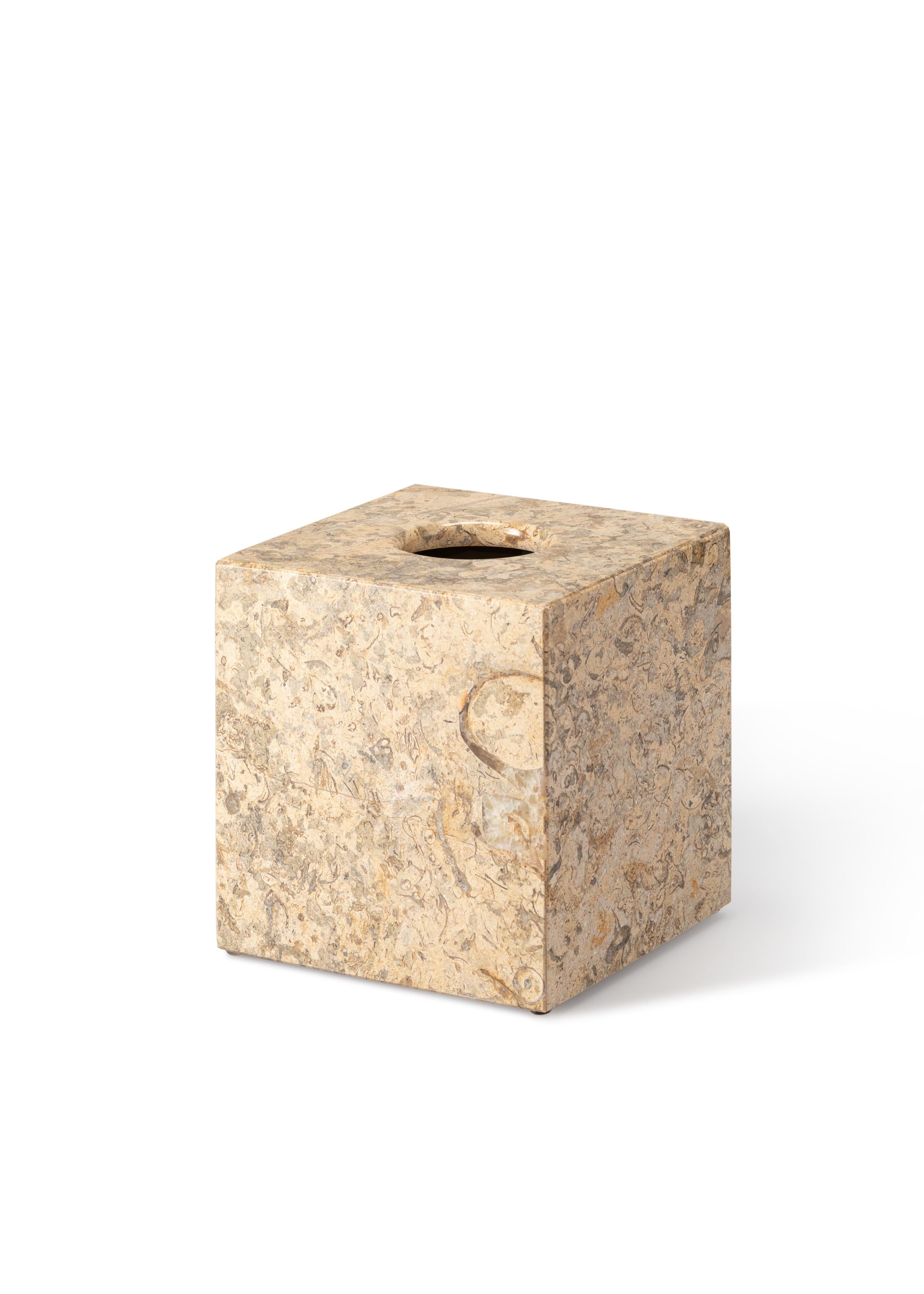 Crafted entirely by hand, this marble tissue box cover is a fusion of form and function, seamlessly blending into any space while adding sophistication and elegance. Clean, minimalist lines highlight the natural veining of the marble, making each