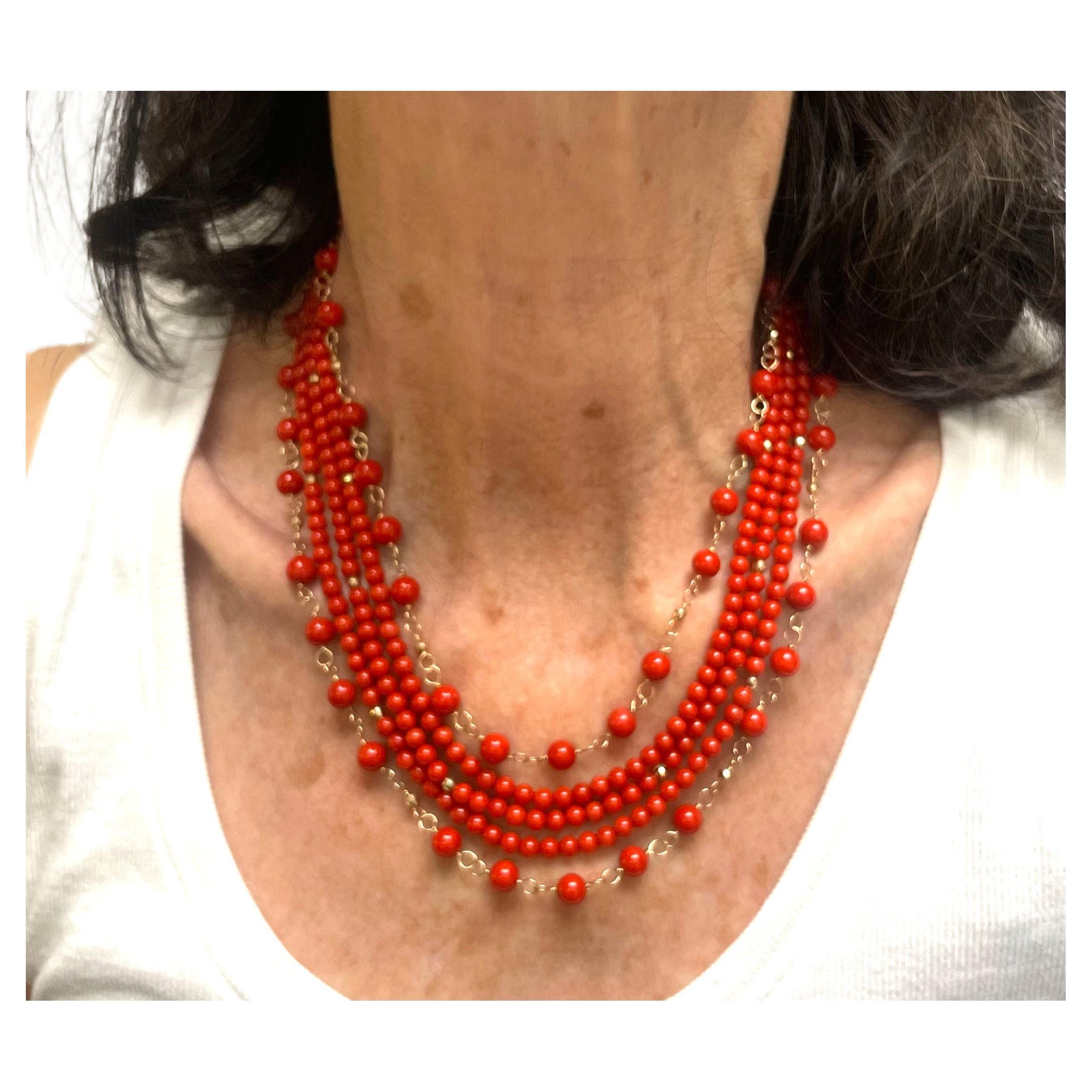 Description
This vibrant and happy five strand Coral necklace doesn’t go unnoticed. The mix of hand wire-wrapped and classically strung Coral strands, combined with scattered 14k gold faceted balls, makes a feminine and elegant statement. 
Item #