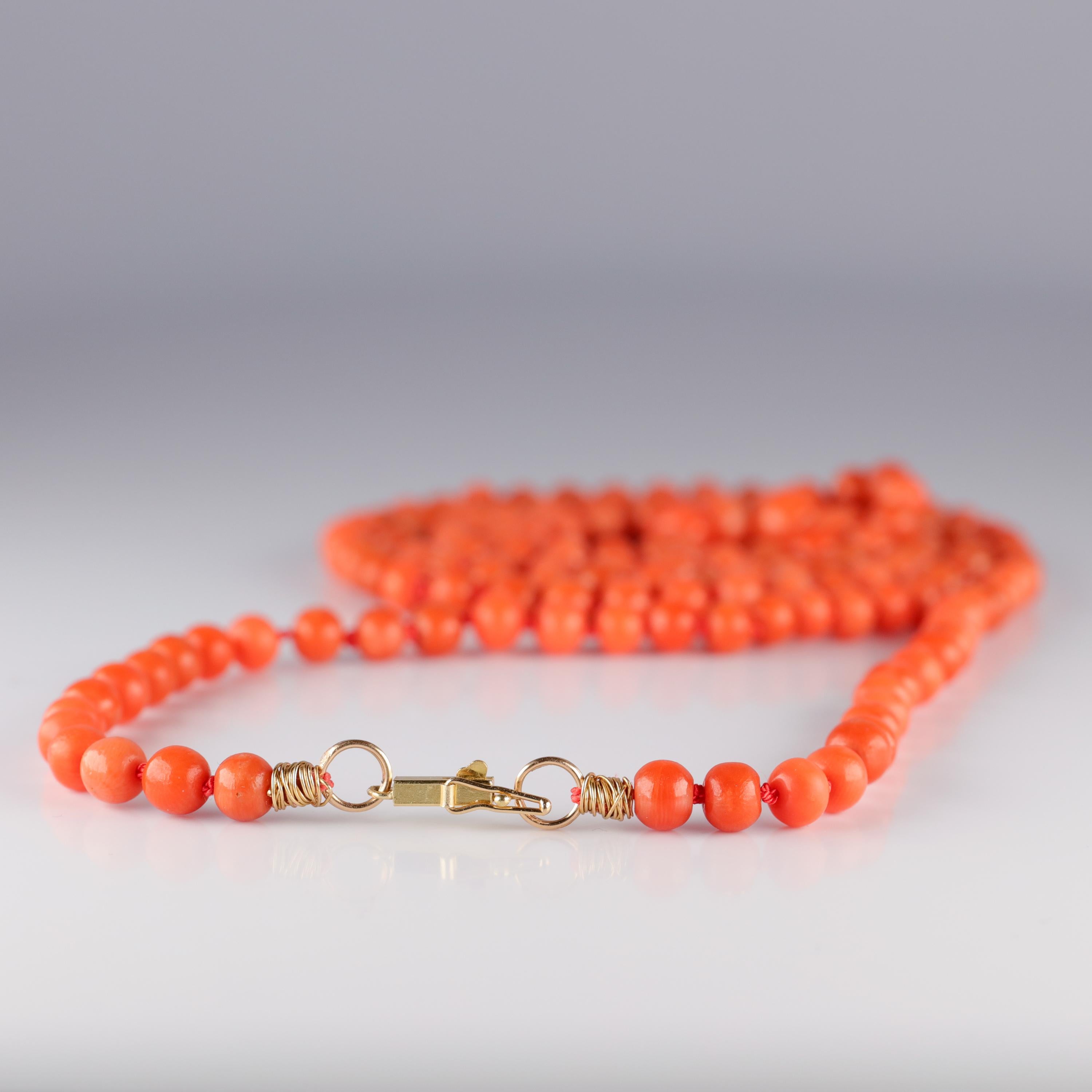 Three feet of natural, tomato-red coral beads. I kind of feel like I don't really need to say anything more. Except maybe this: it's actually 38 ½ inches, which is 2 ½ inches longer than three feet. So. Long. And gorgeous.

This luxuriously long