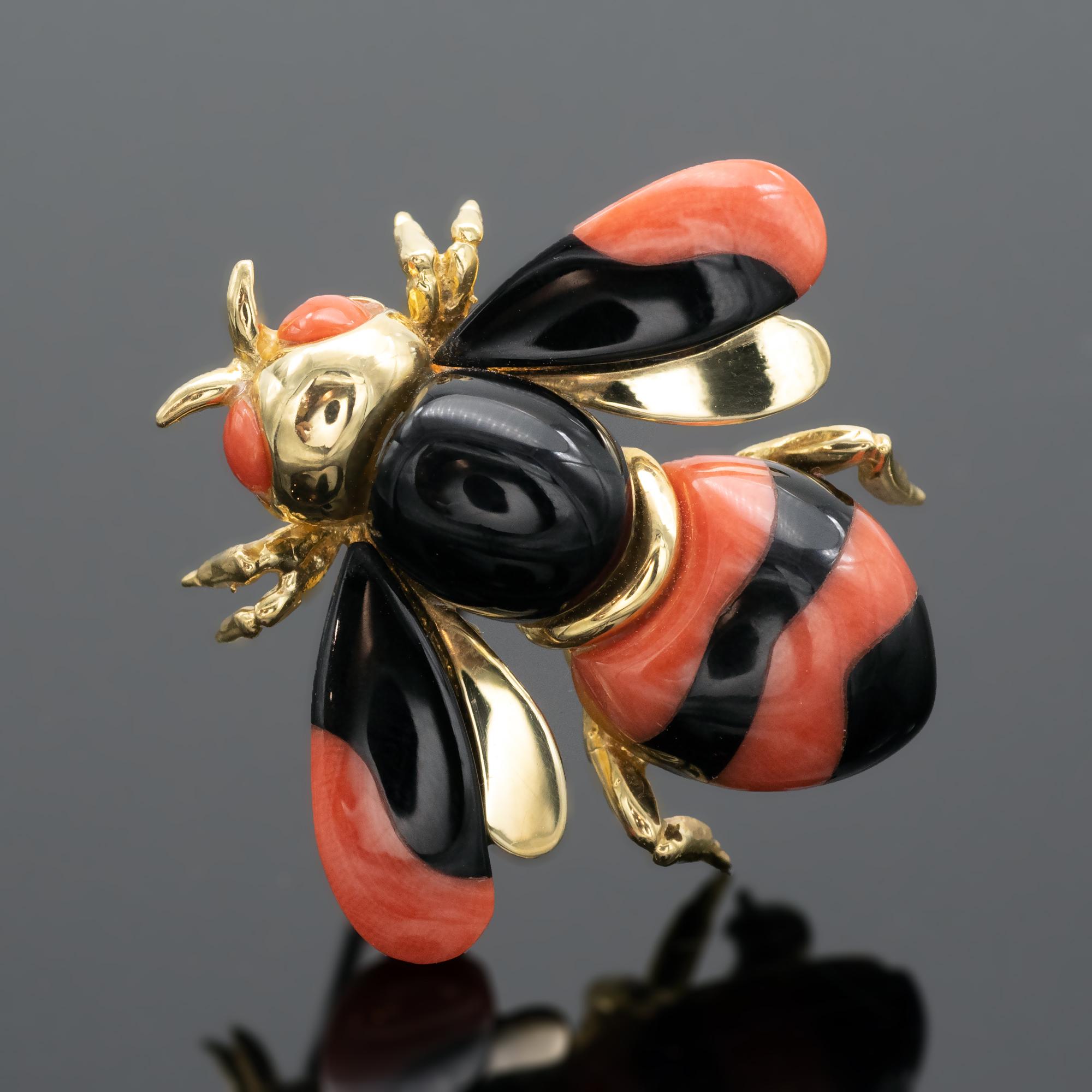 To make this brooch representing a bee ( bumble bee) the coral and onyx have been cut and adjusted with prodigious accuracy.  The animal seems nearly alive .
French state hallmark