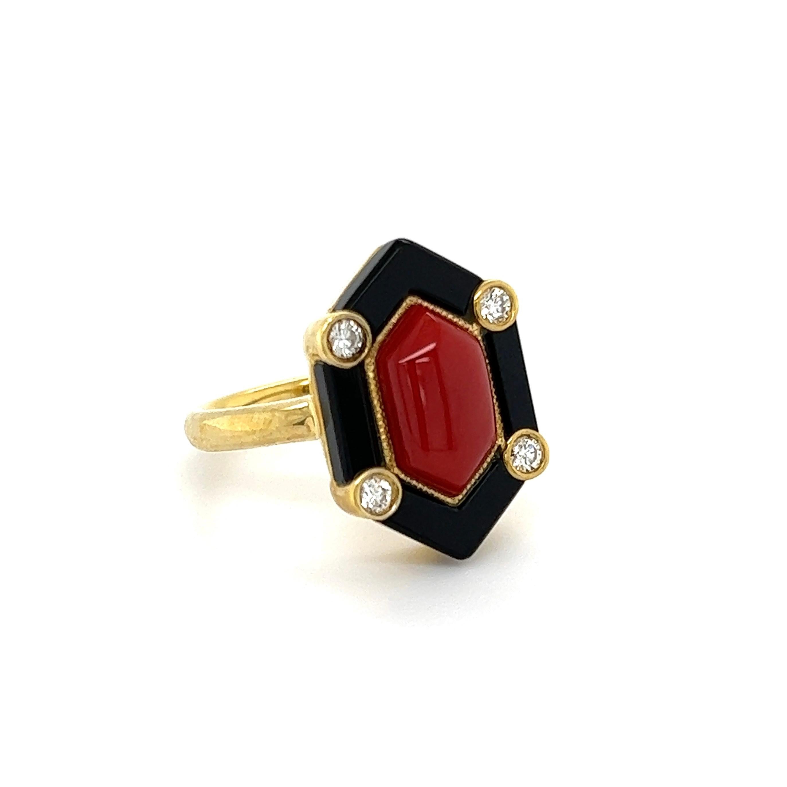 Simply Beautiful! Hexagon Cabochon Coral and Black Onyx Ring, accented by 4 Diamonds, approx. 0.16 total carat weight. Hand crafted 18K Yellow Gold mounting. Dimensions 96” l x 0.78” w x 0.75” h.  Ring size 6, we offer ring resizing. The perfect