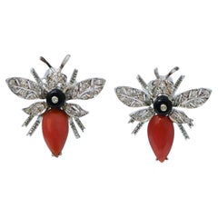 Coral, Onyx, Garnets, Diamonds, Platinum Fly Earrings.