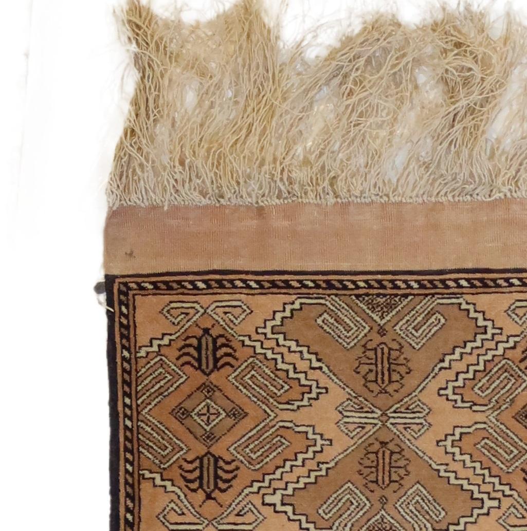 black and nude rug