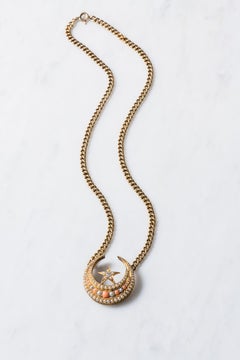 Coral, pearl and diamond Crescent pendant necklace, Early 20th Century