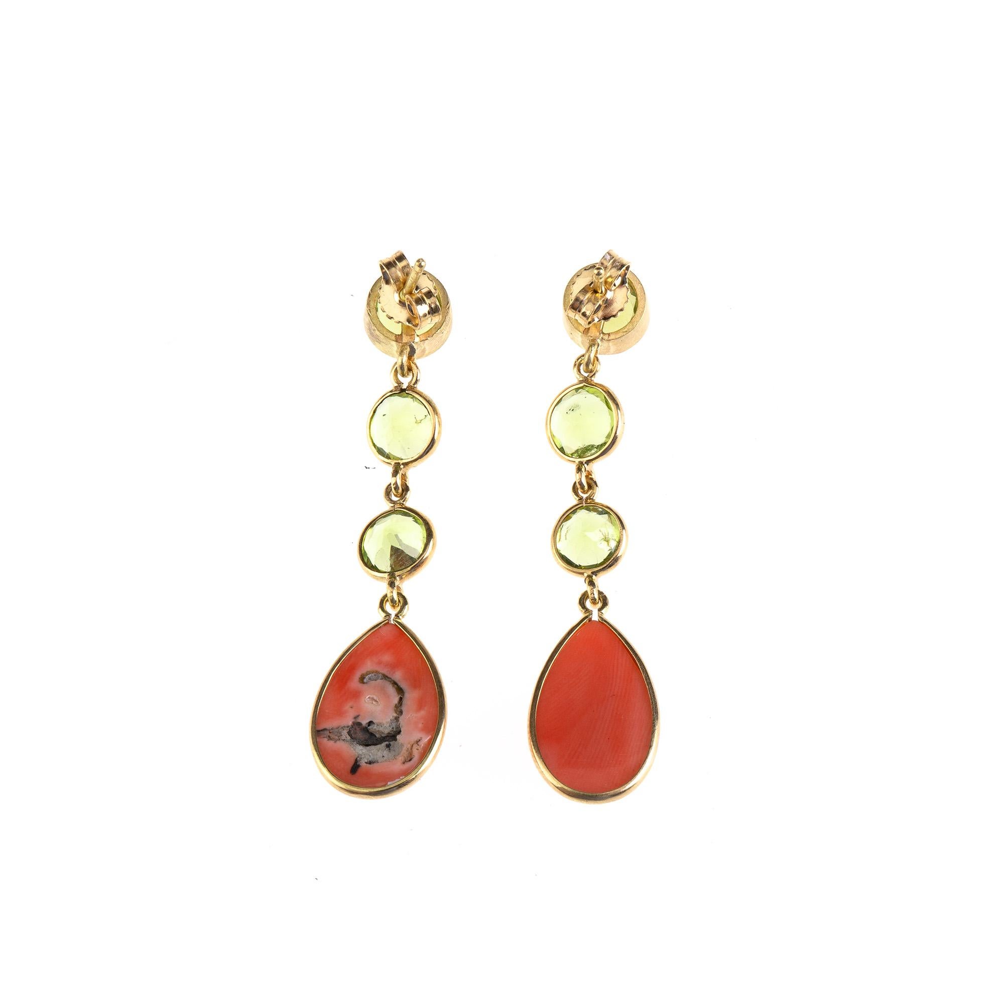 Carved sciatica coral,  peridot, 18 k Gold gr 7,80 earrings.
All Giulia Colussi jewelry is new and has never been previously owned or worn. Each item will arrive at your door beautifully gift wrapped in our boxes, put inside an elegant pouch or