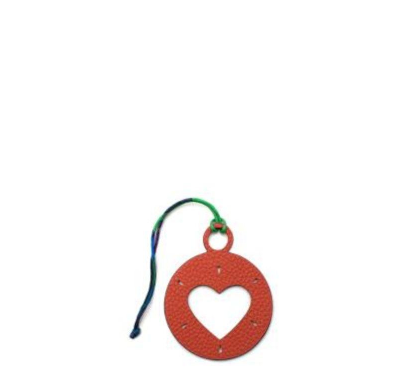 Hermes Round Leather Charm
 
 -Crafted from Epsom Leather with a cut out the heart shape 
 
 Made In France