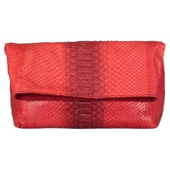 Coral Snakeskin Fold Over Clutch Handbag From Laurent Effel St Barth