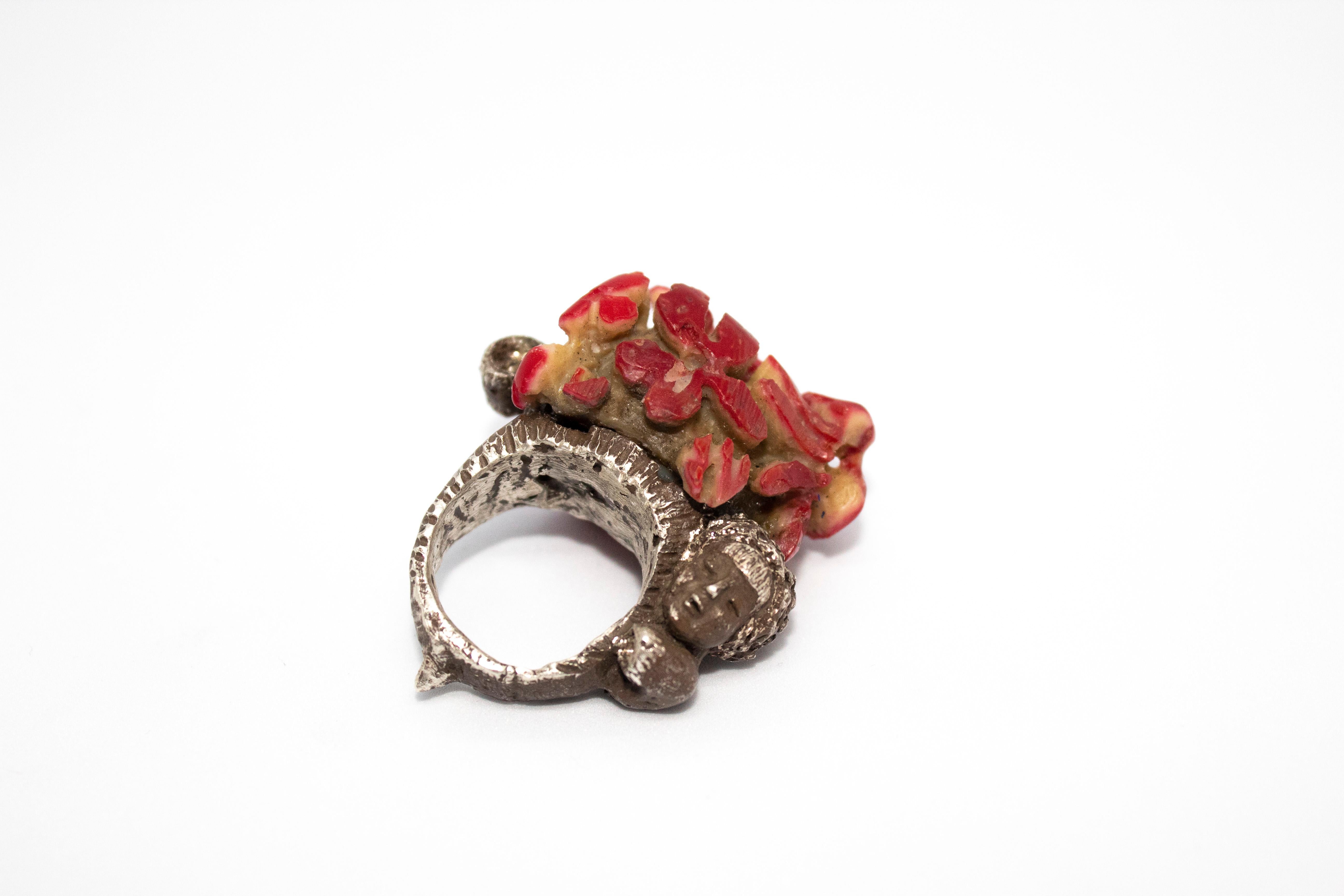 Award-winning ring, made with silver and coral stone 