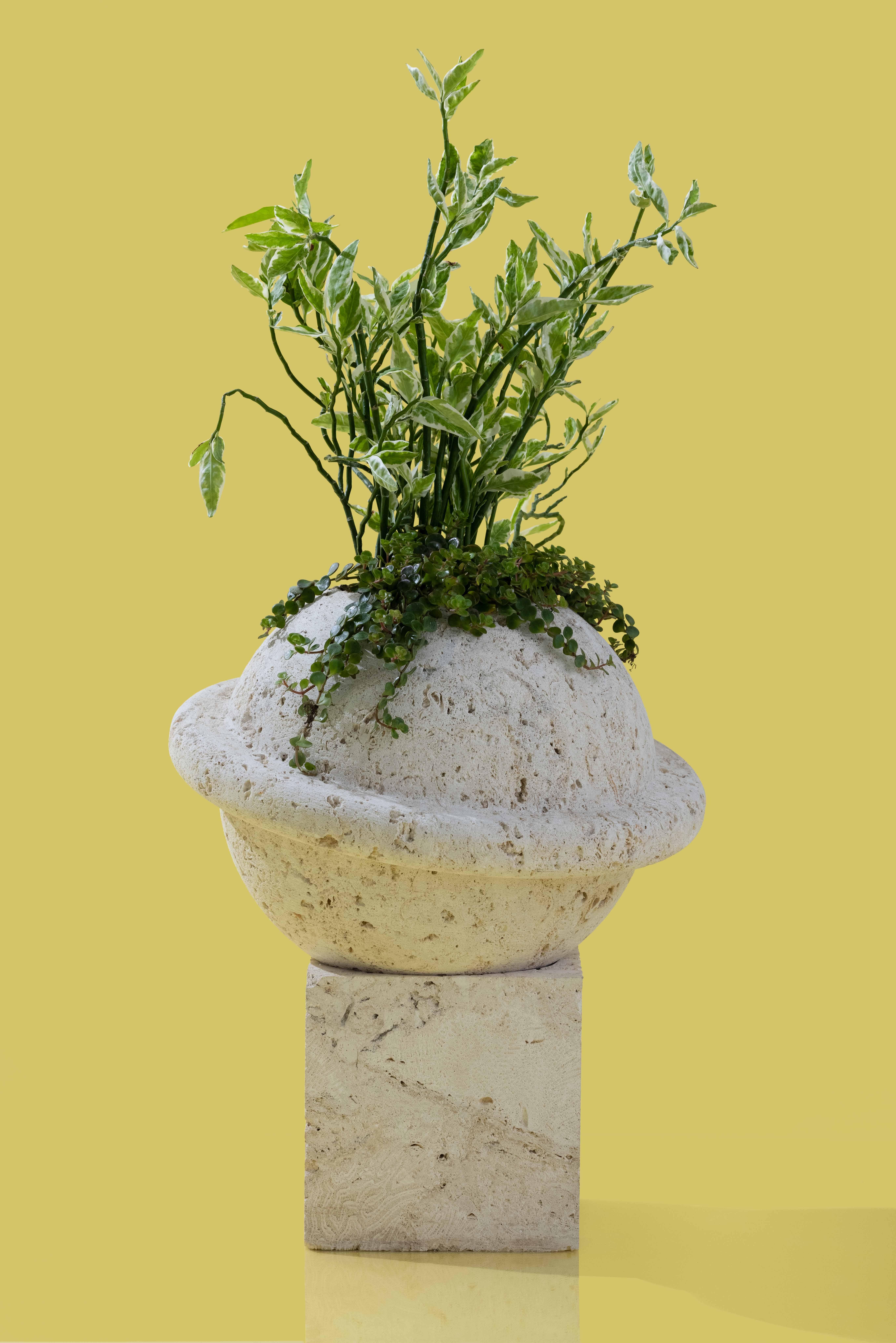 Made to order keystone Saturn with base. 16” diameter 20” ring with 10x10” base.

Inspired by Coral Castle, an oolite limestone structure
created by the Latvian-American eccentric Edward
Leedskalnin in the 1920’s during a time where there