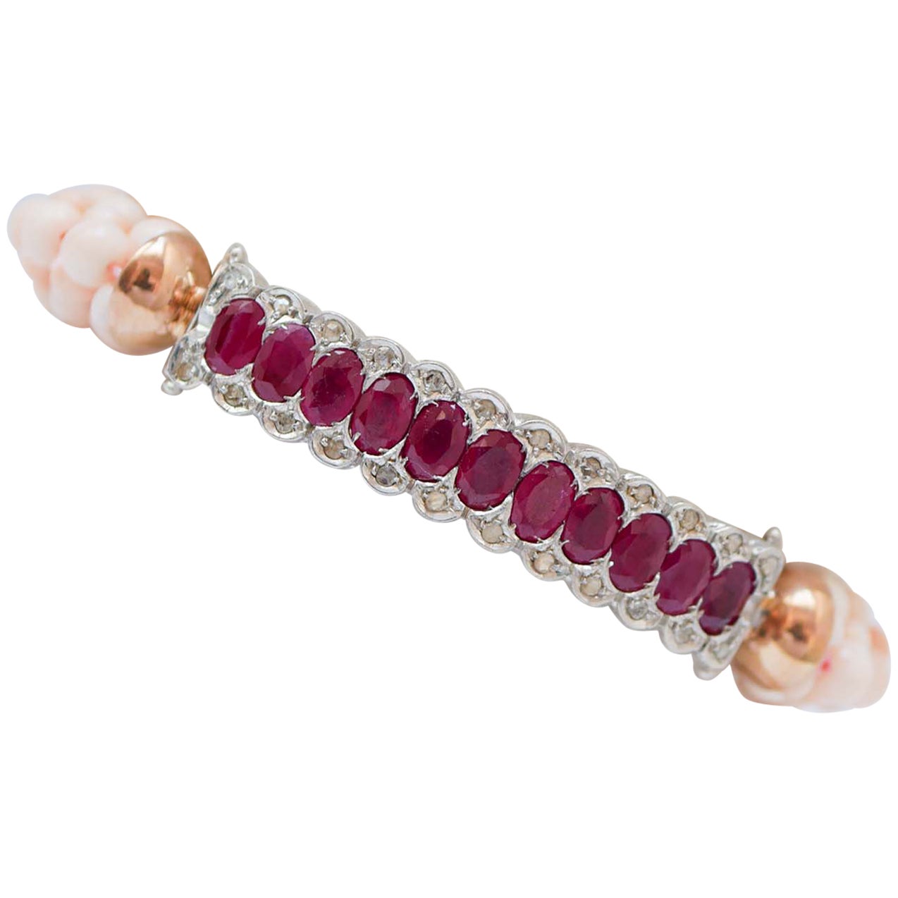 Bracelet en or rose, rubis, diamants et corail.