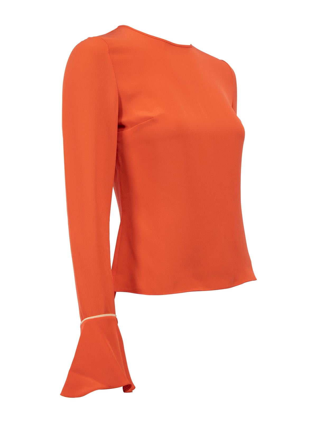 CONDITION is Never worn, with tags. No visible wear to top is evident on this used Roksanda designer resale item. 
 
 Details
  Coral
 Silk
 Top
 Long bell sleeve
 Round neckline
 Ruffled cuffs
 Back zip fastening with hook and eye
 
 
 Made in