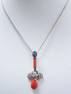 Coral, Sapphires, Diamonds, 14 Karat Rise Gold and Silver Pendant.