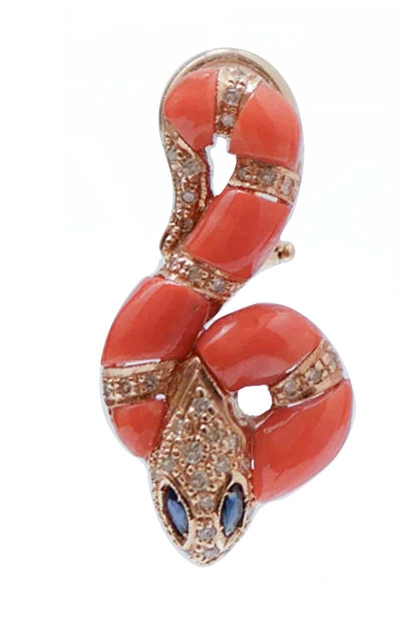 Fashion snake earrings in 14 kt rose gold mounted with coral and diamonds for all the body; on the head, diamonds and two sapphires as eyes.
These earrings were totally handmade by Italian master goldsmiths and they are in perfect