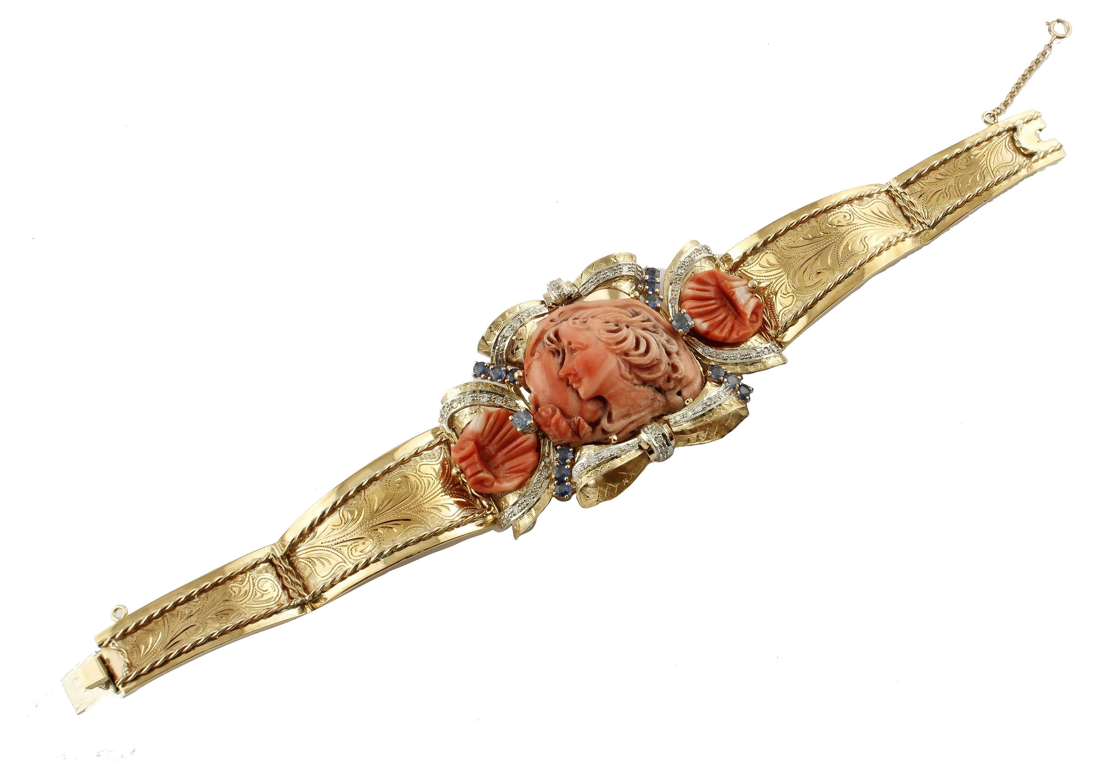 Beautiful bracelet in pink gold all engraved 9 kt , has a very elegant and delicate designe, the central of this jewel is coral representing a goddess with also two side shells always in coral from 9.50 g, all embellished with diamonds from ct 0.70