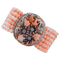 Bracelet en corail, saphirs, rubis, émeraudes, diamants, or rose et argent.