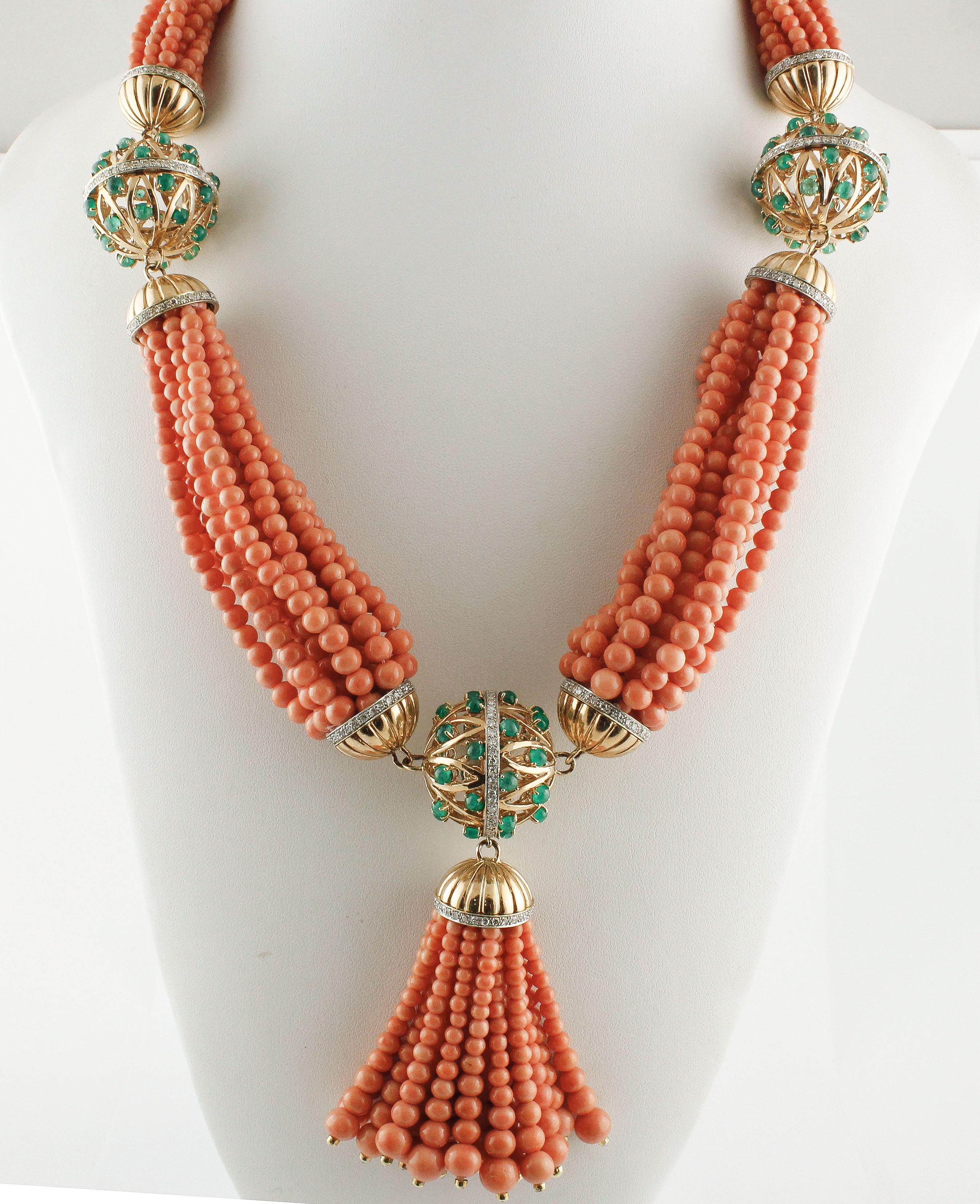 Elegant necklace composed of multi strand of coral linked by spheres in 14Kt rose gold each adorned with three half spheres of emeralds and diamonds.
coral (184.40 gr),
emeralds(16.09Kt) 
diamonds(7.25 Kt)
tot weight 263.8gr
Rf.1295008

For any