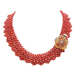 Collar de coral, topacio, rubíes, perlas, oro rosa y plata.