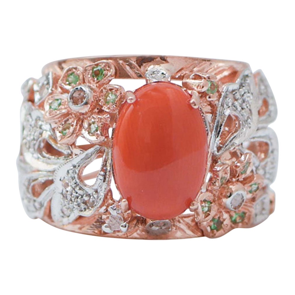 Ring aus Koralle, Tsavorit, Rubinen, Diamanten, Roségold und Silber.