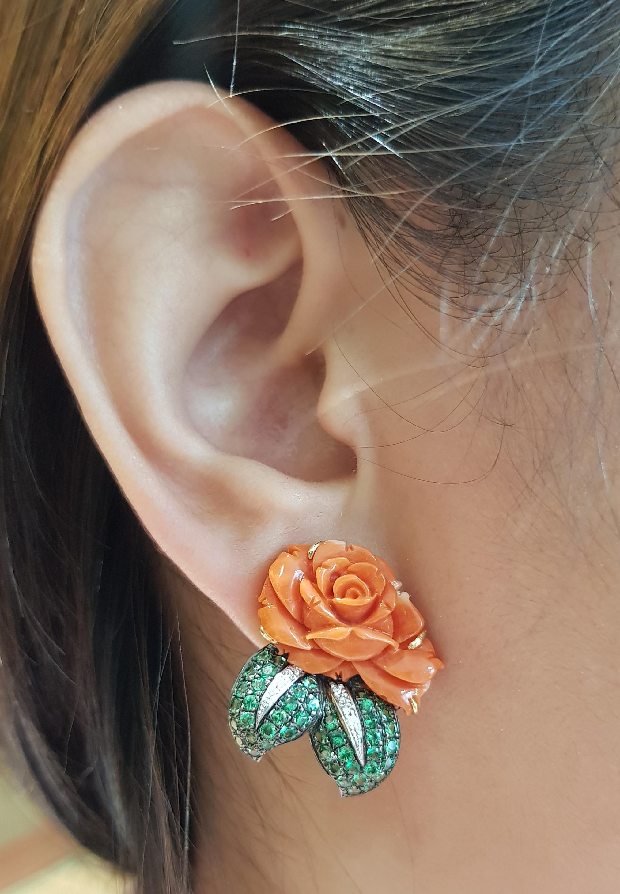 Coral 3.16 carats with Tsavorite 1.86 carats and Diamond 0.11 carat Earrings set in 18 Karat Gold Settings

Width:  2.1 cm 
Length: 2.8 cm
Total Weight: 13.99 grams

