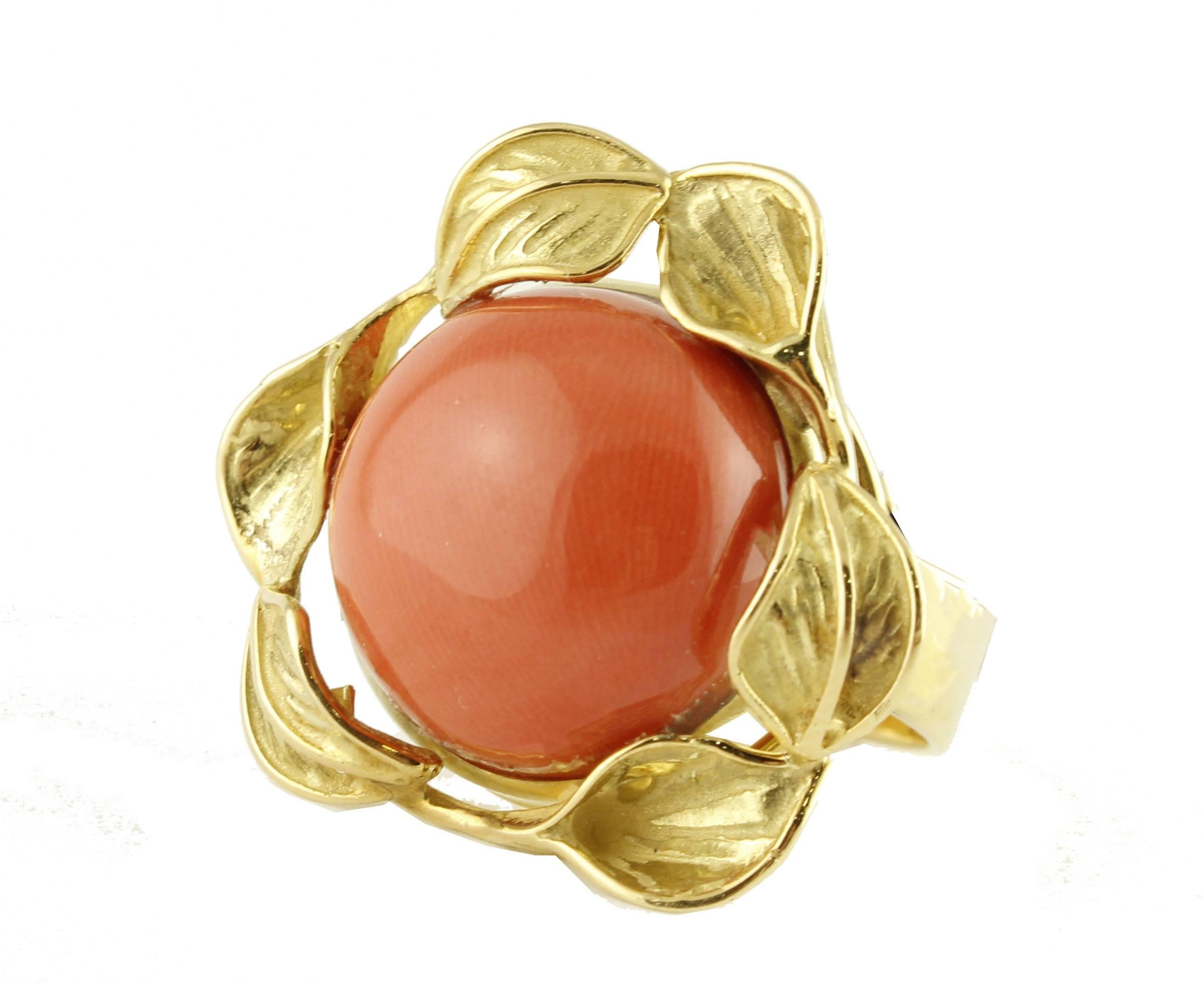 Fabulous ring in yellow gold , with worked leaves all around a wonderful center coral button 
Coral g 3.80/ 16 mm
Total weight g 12.30
RF + uuee
Size Italian 15
Size French 55
Size Usa 7.17

For any enquires, please contact the seller through the