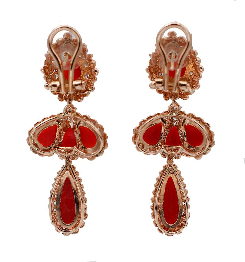 SHIPPING POLICY: 
No additional costs will be added to this order. 
Shipping costs will be totally covered by the seller (customs duties included).

Elegant dangle earrings in 14 karat rose gold mounted with diamonds and coral
These earrings were