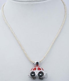 Coral, Diamonds, Onyx, 18 Karat White Gold Car Pendant Necklace