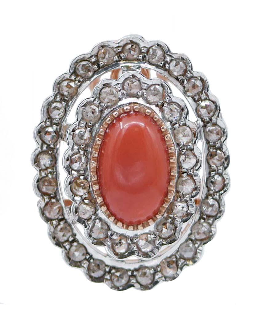 SHIPPING POLICY: 
No additional costs will be added to this order. 
Shipping costs will be totally covered by the seller (customs duties included).

Gorgeous earrrings in 9 kt rose gold and silver structure mounted with a central coral surrounded by