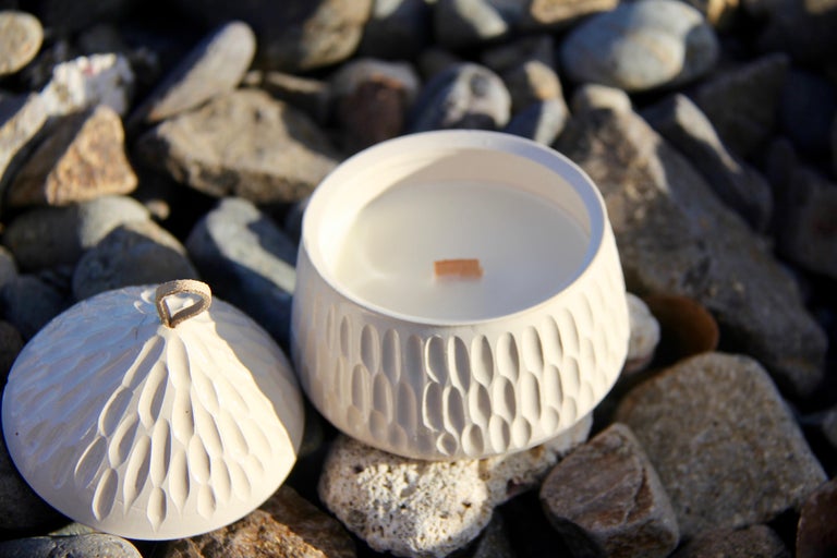 A beautiful scented candle presented in a unique handmade artisan ceramic jar. Infused with the finest botanical fragrance oils. Our premium candles are poured into luxury handmade artisan ceramic and are made with a blend of premium, natural Soy &