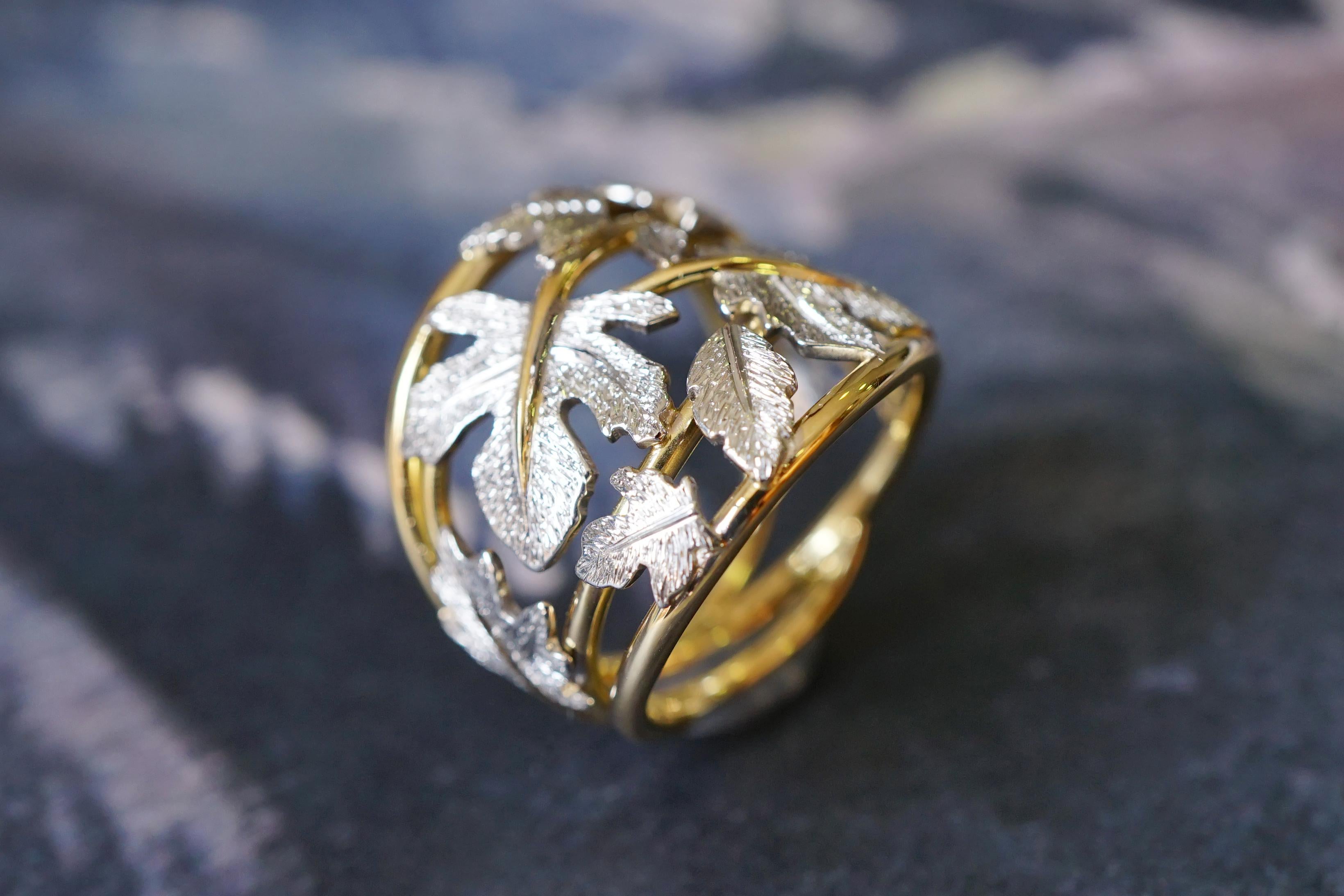 Coralie Van Caloen 18 Carat Bi-color Yellow And White Gold Band Ring With Hand Engraved Fig Leaves is entirely hand made and forged in Belgium by experts goldsmiths therefore it is a very unique piece. Inspired by Mediterranean summer atmospheres