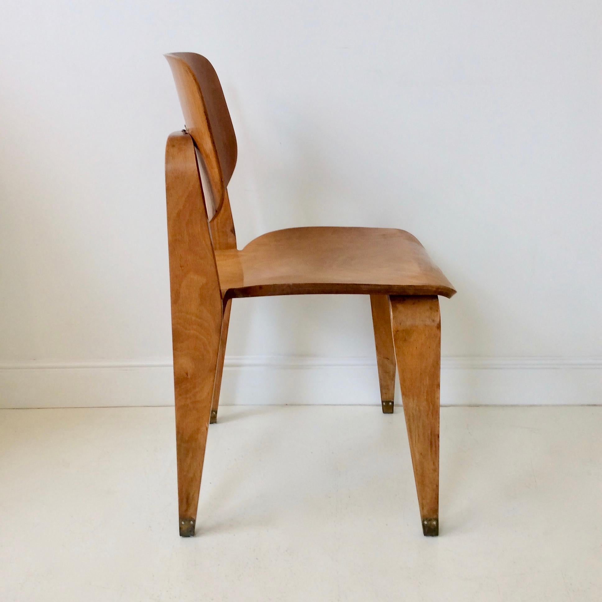 Rare chair by Corbetta designer, circa 1956, Italy.
Plywood and metal.
Dimensions: 81 cm H, 43 cm W, 47 cm D, seat height 46 cm.
Original condition.
We ship worldwide.