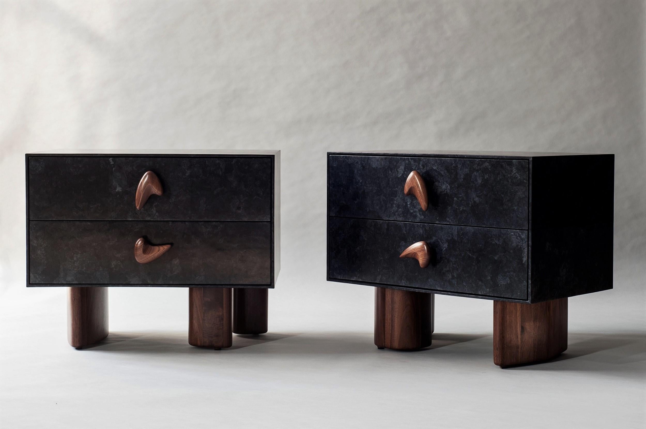 Inspired by the graphic motifs of Le Corbusier's mural paintings, the solid form of the Corbu bedside table is defined by rhythmically placed handles. Architectural legs lend support and an unexpected element of asymmetry.

This listing is for an
