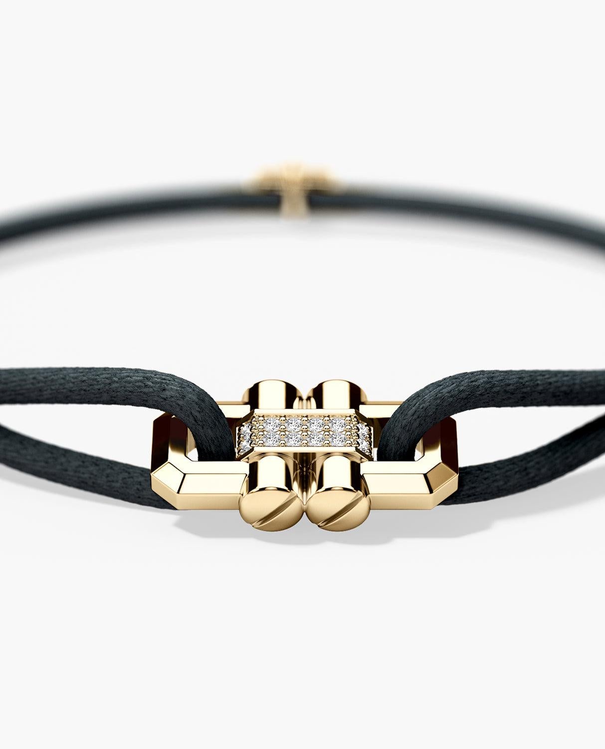 This handmade silk cord bracelet is available in 14k Yellow Gold with 0.12ct white diamonds. Customize your bracelet further by choosing either a black or red cord. Ready to Ship bracelets are pre-produced, unworn pieces. These bracelets have a