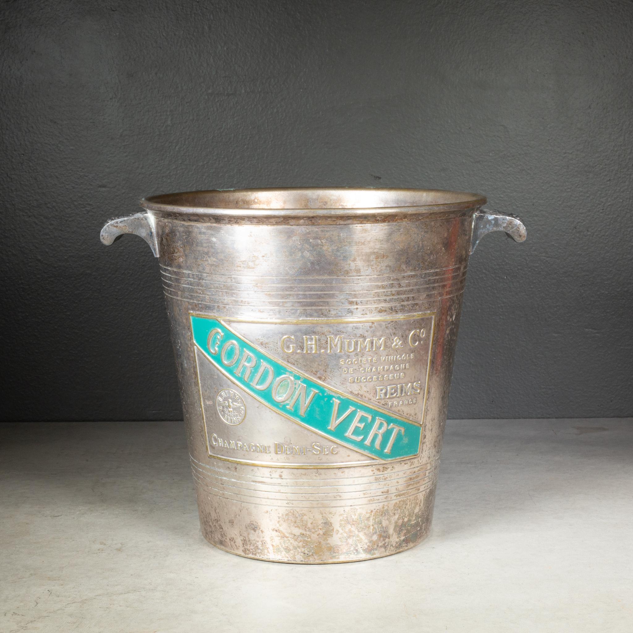 ABOUT

Rare double sided nickel plate and brass Mumm Champagne bucket with embossed lettering on enamel for Cordon Rouge - Champagne Trés Sec and Cordon Vert Champagne Demi-Sec on alternate sides. 

    CREATOR Argit Paris, Made in France. 
    DATE