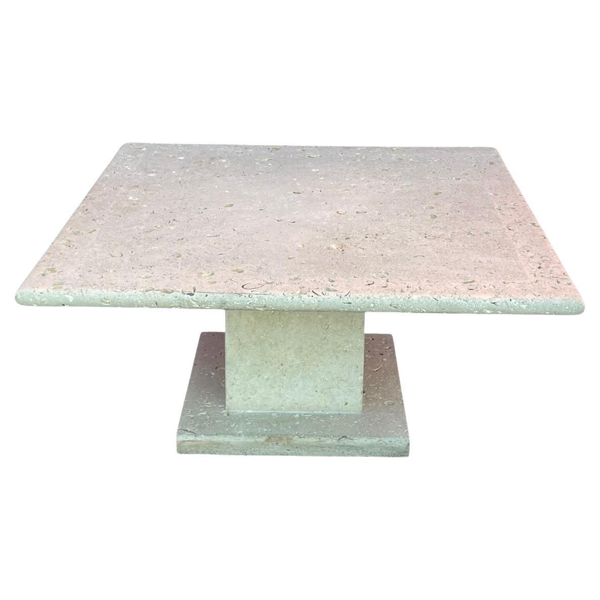 Cordova shell limestone dining table, mid 20th century