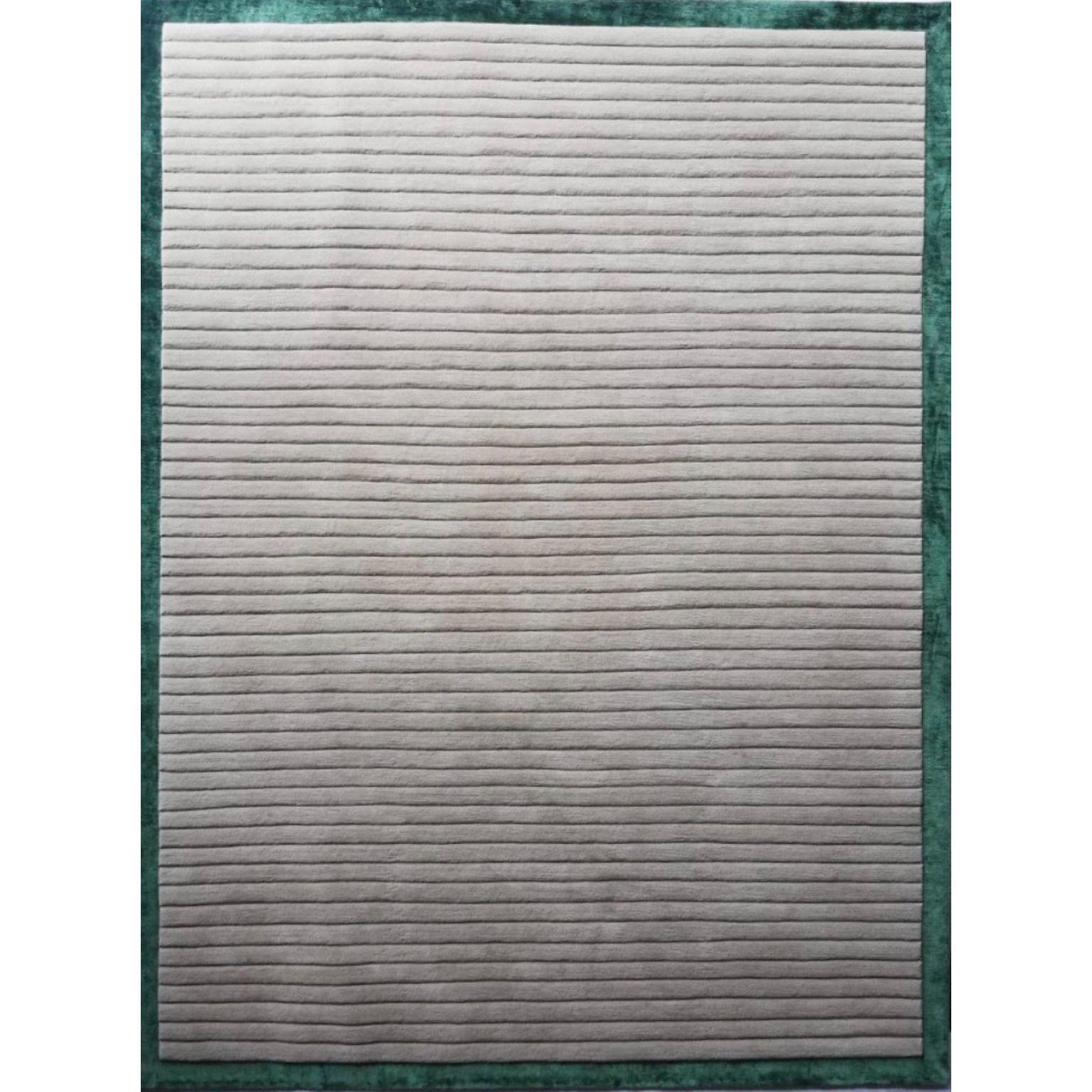 Corduroy framed medium rug by Art & Loom
Dimensions: D274.3 x H365.8 cm
Materials: New Zealand wool & Chinese silk
Quality (Knots per Inch): 100
Also available in different dimensions.

Samantha Gallacher has always had a keen eye for