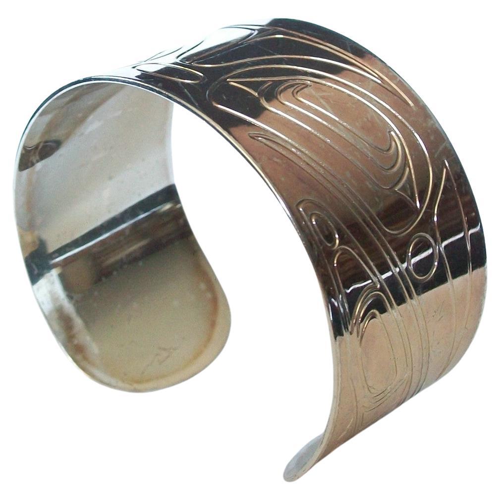 Corey W. Moraes - Tsimshian, White Metal Raven Cuff Bracelet, Canada, circa 2000 For Sale