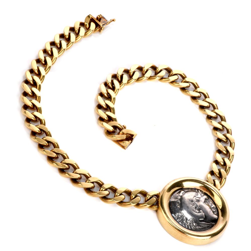 This 1980's with solid  18k gold Corinth pendant neckace with heavy solid 18k yellow gold likns and antique Roman Silver coin. This  ancient silver coin from is set in 18k yellow gold bezel.

The necklace is 15.2