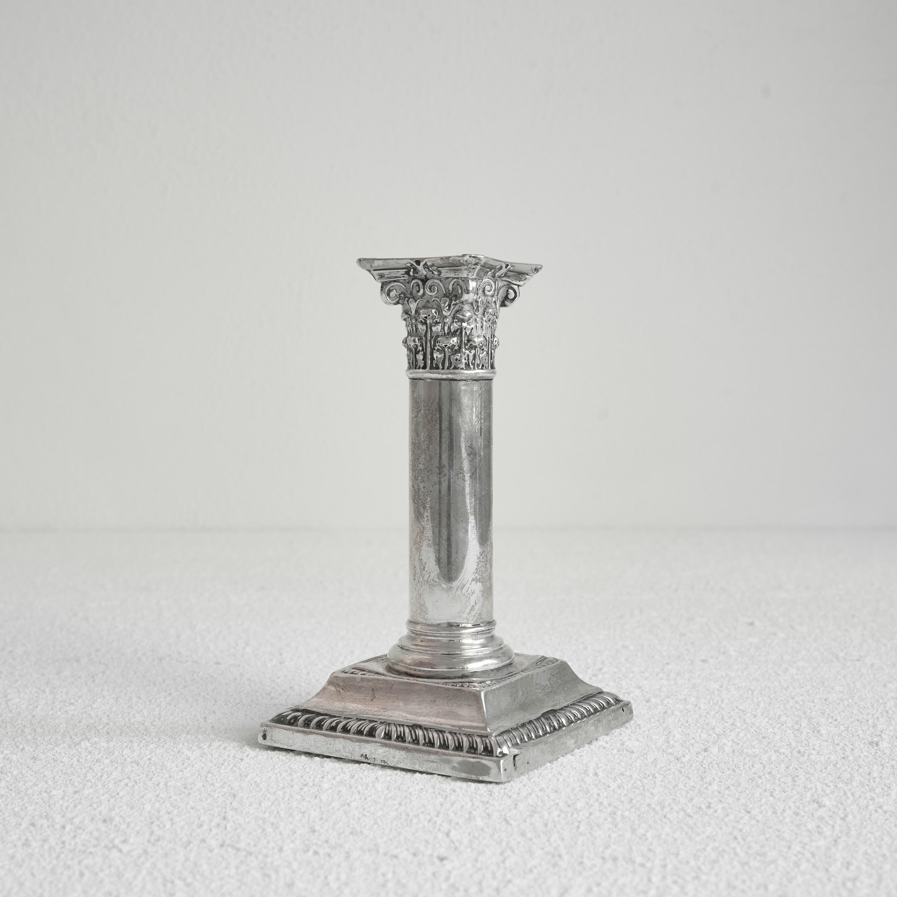 Corinthian column candle holder in solid silver

Wonderful and highly detailed column candle holder in heavy silver. 

Great piece with a beautiful classical appearance. Corinthian column shape. 

A nice and elegant piece on your breakfast or