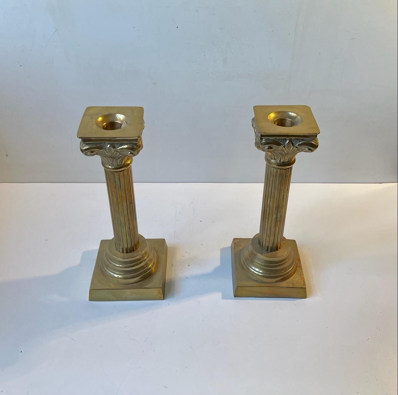 European Corinthian Column Candlesticks in Brass For Sale