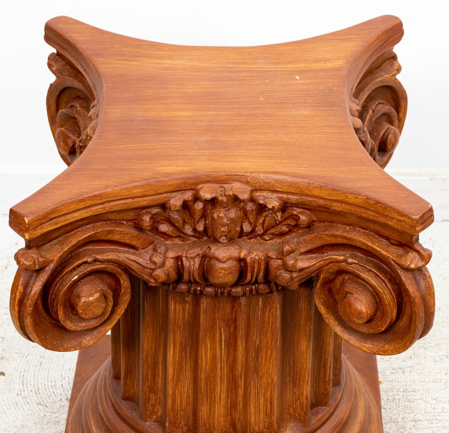 Vintage neoclassical style fluted column side table in an Ochre color painted composition material with highly detailed carving of Corinthian column capital. Please note of wear consistent with age including minor paint loss and overall wear