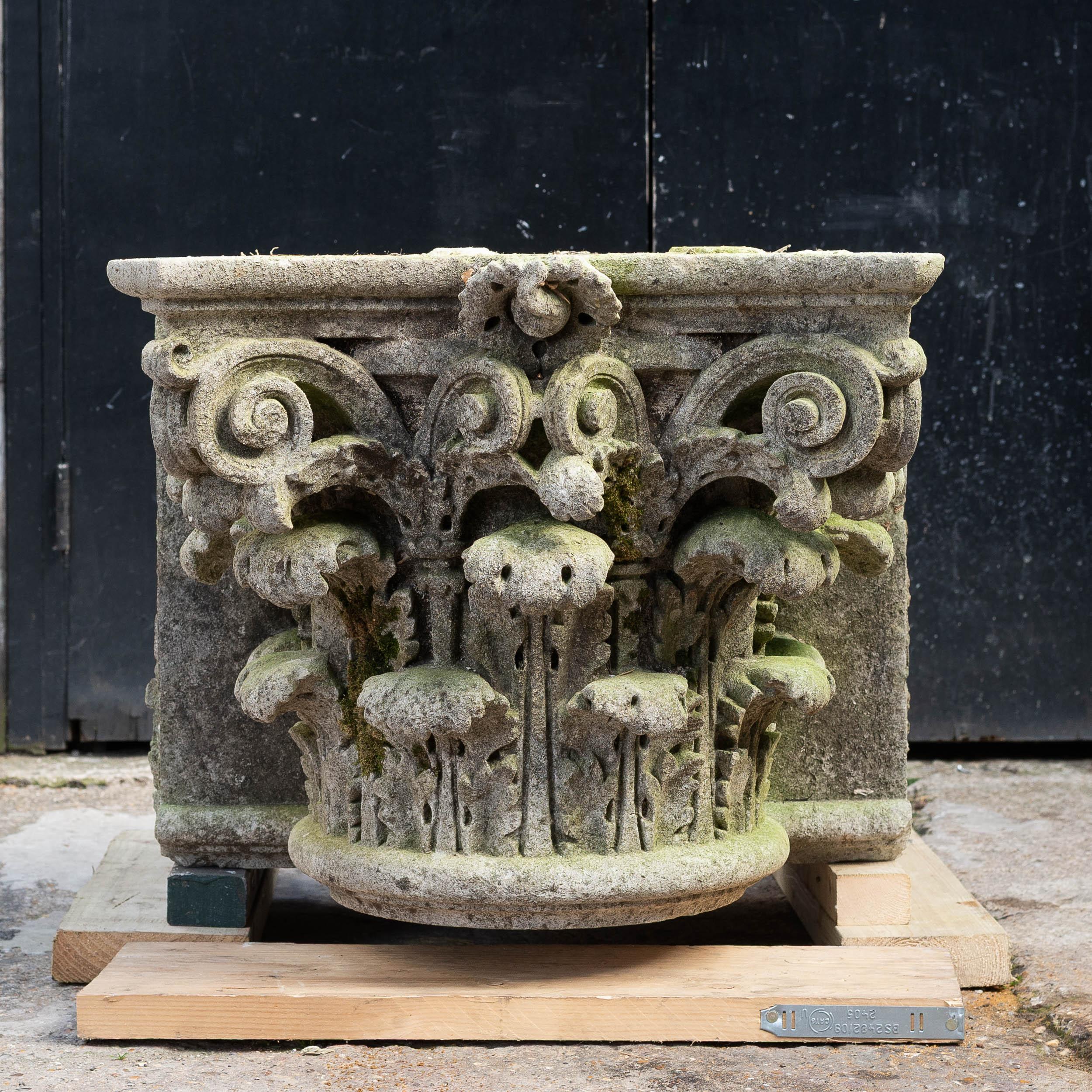 An English, Corinthian Order pilaster capital carved in Portland Stone, likely mid-nineteenth century. Provenance unknown. Attractively weathered throughout. 