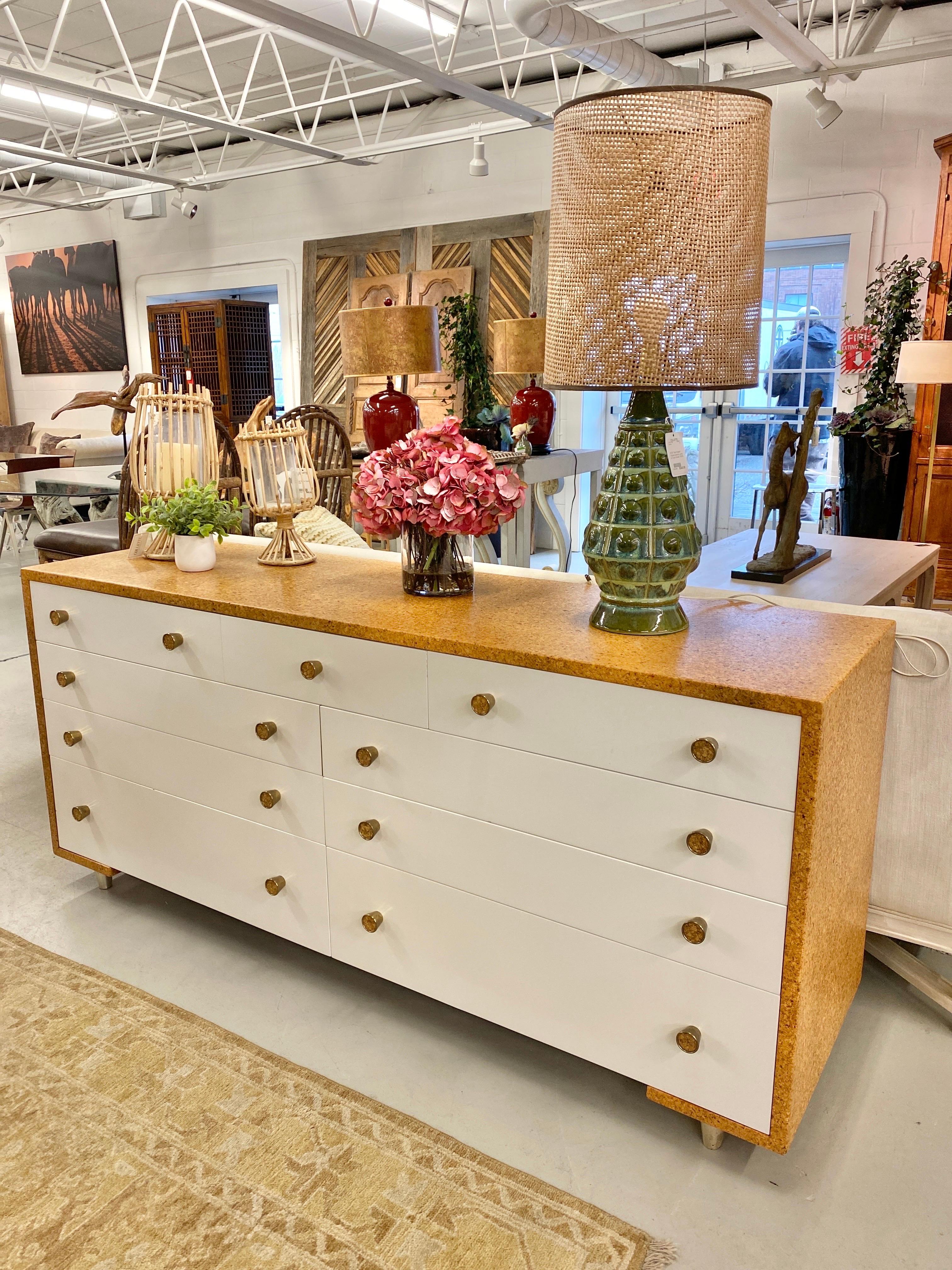 Cork and white lacquer 9 drawer dresser by Paul Frankl Johnson Furniture Co.
Waterfall Cork with solid brass cork pulls.