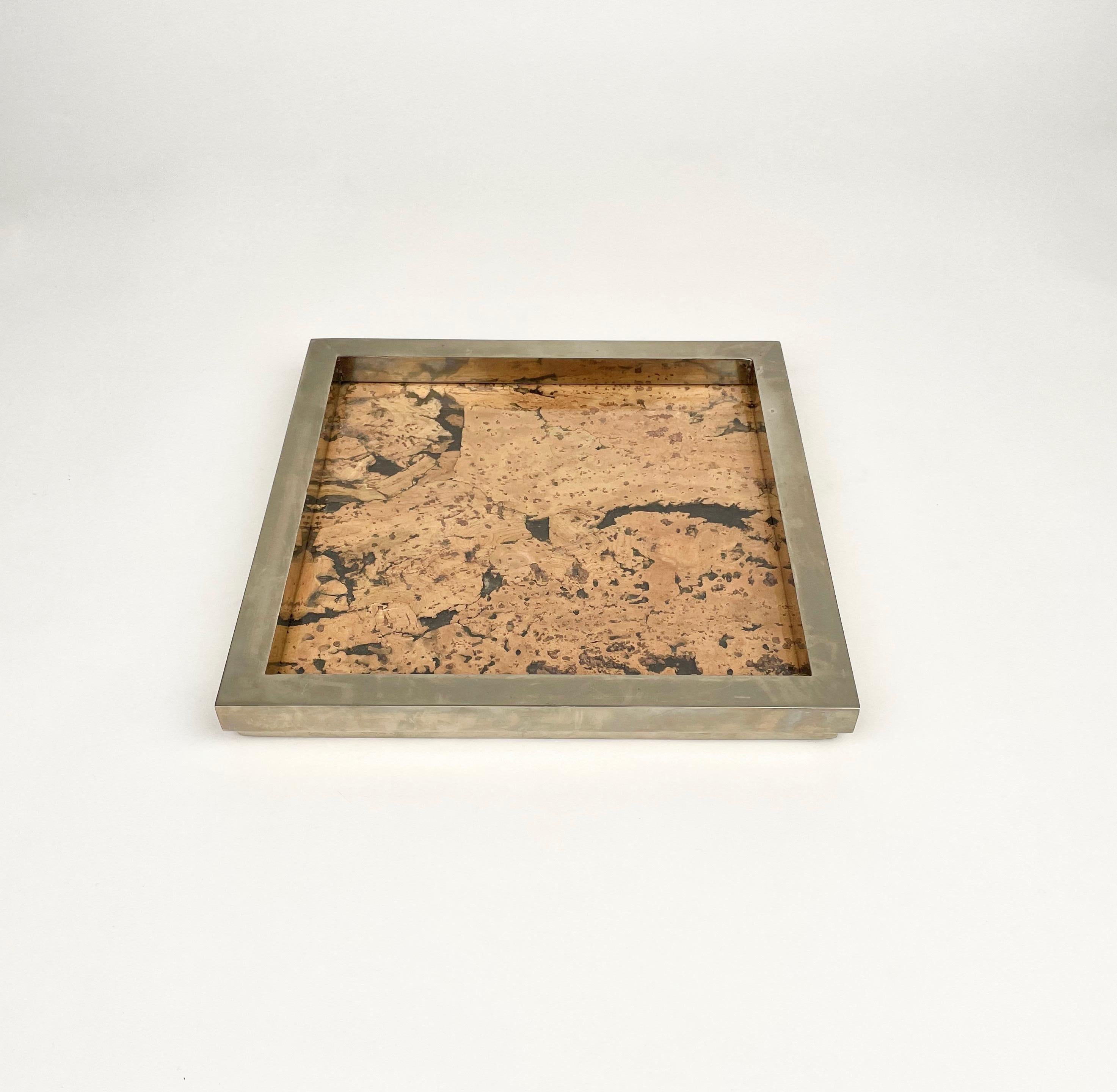 Marvelous Mid-Century square vide pocket emptier sundries tray in chrome, glass and cork. This amazing piece was designed in the style Christian Dior in the 1970s. The combination of materials is simply breathtaking, a magnificent chrome frame